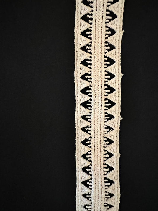 Black Top with Beige Lace Detailing on Front and Sleeves